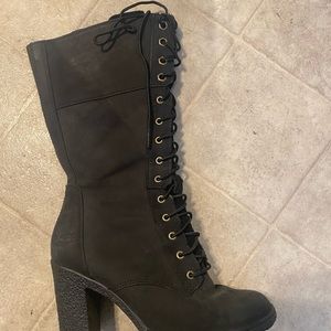 Mid length lace up leather boots